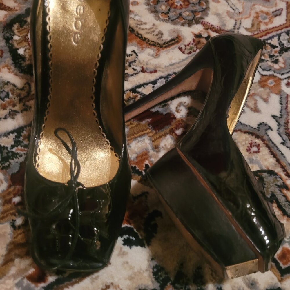 Bebe Platform Stilettos size 8